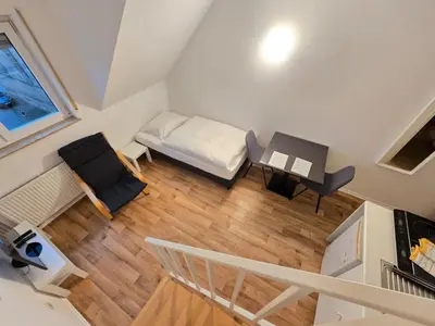 Ein Bett oder Betten in einem Zimmer der Unterkunft Apartments EFDE Boardinghouse Heilbronn
