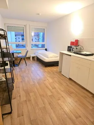 Ein Bett oder Betten in einem Zimmer der Unterkunft Apartments EFDE Boardinghouse Heilbronn