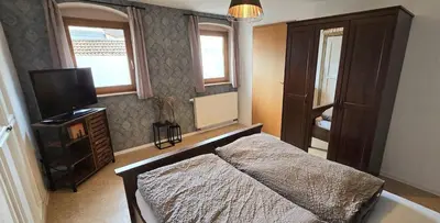 Ein Bett oder Betten in einem Zimmer der Unterkunft Ferienwohnung Freiraum