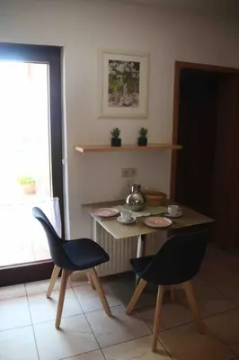 Ein Sitzbereich in der Unterkunft Fröhlich Wohnen in Fewo Frölich