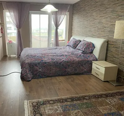 Ein Bett oder Betten in einem Zimmer der Unterkunft A private room in a shared apartment