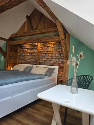 Ein Bett oder Betten in einem Zimmer der Unterkunft Froschgass Apartments