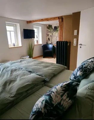 Ein Bett oder Betten in einem Zimmer der Unterkunft Froschgass Apartments