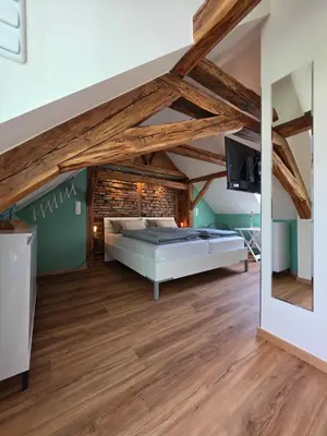 Ein Bett oder Betten in einem Zimmer der Unterkunft Froschgass Apartments