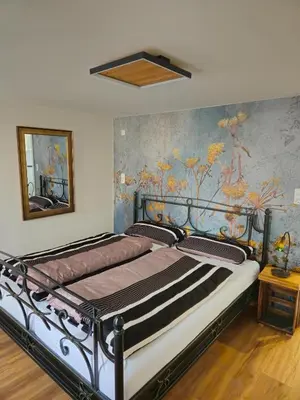 Ein Bett oder Betten in einem Zimmer der Unterkunft Froschgass Apartments