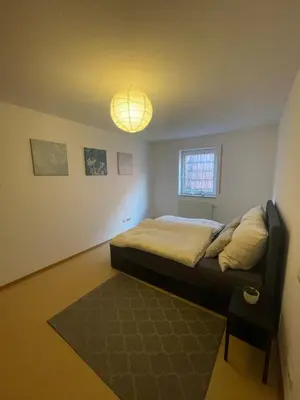 Ein Bett oder Betten in einem Zimmer der Unterkunft Ferienwohnung im Herzen von Walldürn