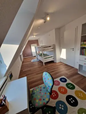 Ein Bett oder Betten in einem Zimmer der Unterkunft Ferienhaus Urlaub-in-Edenkoben