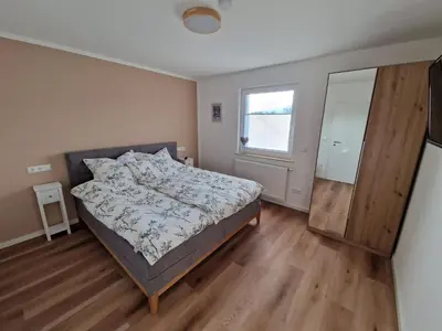 Ein Bett oder Betten in einem Zimmer der Unterkunft Ferienhaus Urlaub-in-Edenkoben