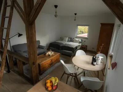 Ein Bett oder Betten in einem Zimmer der Unterkunft Taubenschlag