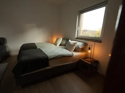 Ein Bett oder Betten in einem Zimmer der Unterkunft Taubenschlag
