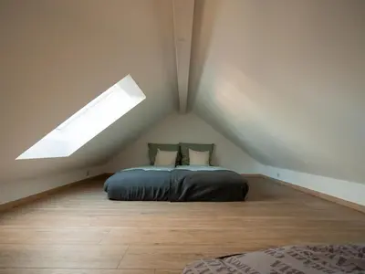 Ein Bett oder Betten in einem Zimmer der Unterkunft Taubenschlag