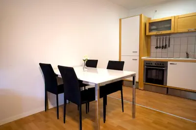 Küche/Küchenzeile in der Unterkunft Modern und Gemütlich, Ferienwohnung mit Balkon und Netflix in Leimen WeHome Komfort