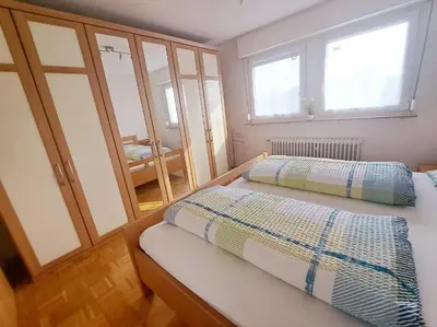 Ein Bett oder Betten in einem Zimmer der Unterkunft Ferienwohnung Grundel