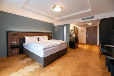 Ein Bett oder Betten in einem Zimmer der Unterkunft UNICO Boutique Hotel