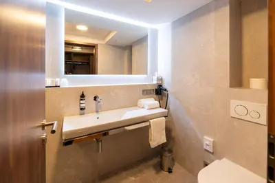 Ein Badezimmer in der Unterkunft UNICO Boutique Hotel