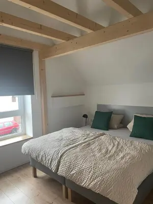 Ein Bett oder Betten in einem Zimmer der Unterkunft FREIGEIST Rooms
