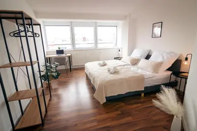 Ein Bett oder Betten in einem Zimmer der Unterkunft 2BR - Apartment Lichtblick