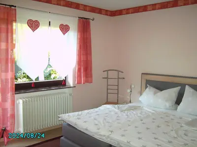 Ein Bett oder Betten in einem Zimmer der Unterkunft Ferienwohnung Haus Patry