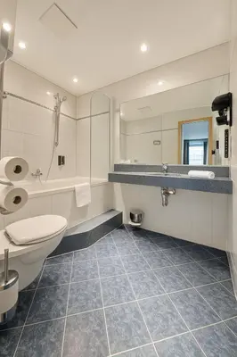 Ein Badezimmer in der Unterkunft AR Boutique Hotel Mannheim