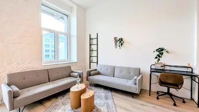 Ein Sitzbereich in der Unterkunft Velaris - Stilvolle Lofts & Penthouses - Premium Wohnen mit Parkplatz & Workstations
