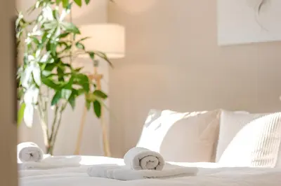 Ein Bett oder Betten in einem Zimmer der Unterkunft Troja Living Helena - Wohnung zentral in Bruchsal