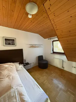 Ein Bett oder Betten in einem Zimmer der Unterkunft Zum Griechen Restaurant und Pension