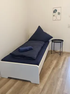 Ein Bett oder Betten in einem Zimmer der Unterkunft Monteurwohnung Pforzheim - L8 Street