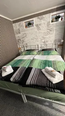 Ein Bett oder Betten in einem Zimmer der Unterkunft Zum Sterngässchen
