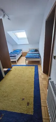 Ein Bett oder Betten in einem Zimmer der Unterkunft Ruhige Wohnung im Obergeschoss
