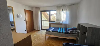 Ein Bett oder Betten in einem Zimmer der Unterkunft Schöne Wohnung mit Kamin