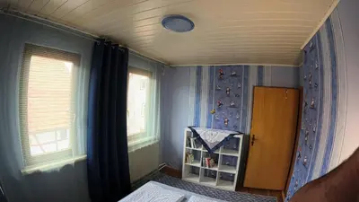 Ein Bett oder Betten in einem Zimmer der Unterkunft Ferienwohnung Landliebe