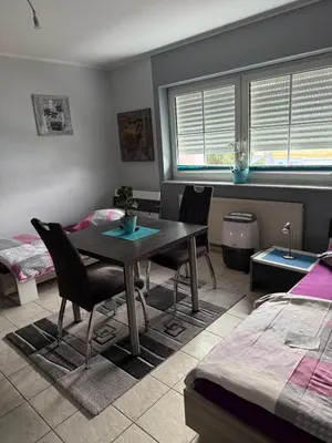 Ein Bett oder Betten in einem Zimmer der Unterkunft Apartment for 2 people Zimmervermietung Lang
