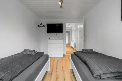 Ein Bett oder Betten in einem Zimmer der Unterkunft SE02 Unterkunft in Pfungstadt!