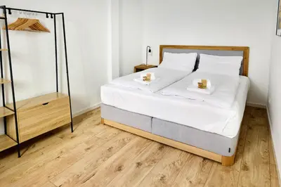 Ein Bett oder Betten in einem Zimmer der Unterkunft hygge-flats Apartment für 2-6, WLAN, Homeoffice