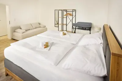 Ein Bett oder Betten in einem Zimmer der Unterkunft hygge-flats Apartment für 2-6, WLAN, Homeoffice