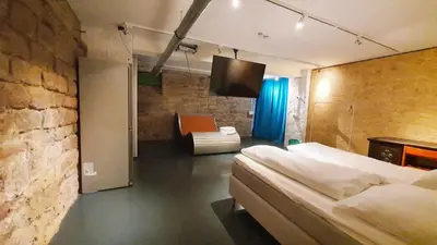 Ein Bett oder Betten in einem Zimmer der Unterkunft Zimmer im Loft II