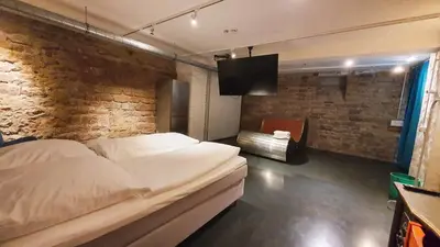 Ein Bett oder Betten in einem Zimmer der Unterkunft Zimmer im Loft II