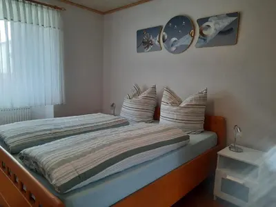 Ein Bett oder Betten in einem Zimmer der Unterkunft Ferienwohnung mit Terrasse