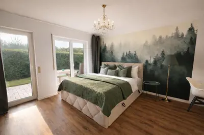 Ein Bett oder Betten in einem Zimmer der Unterkunft Fächerlofts Black Forest Terrasse 40qm Studio WLAN - Messe Karlsruhe