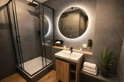 Ein Badezimmer in der Unterkunft Fächerlofts Black Forest Terrasse 40qm Studio WLAN - Messe Karlsruhe