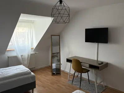 TV/Unterhaltungsangebot in der Unterkunft City Nest Ettlingen - nähe Wasenpark