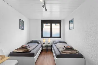 Ein Bett oder Betten in einem Zimmer der Unterkunft SE01 Work & Stay in Pfungstadt