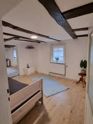 Ein Bett oder Betten in einem Zimmer der Unterkunft Ferienwohnung Heppenheim an der Bergstraße WHG 2