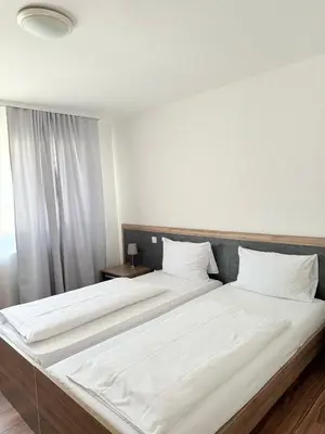 Ein Bett oder Betten in einem Zimmer der Unterkunft Hotel Altavilla
