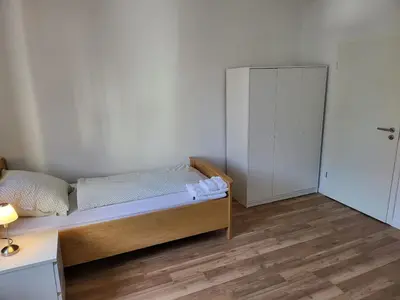 Ein Bett oder Betten in einem Zimmer der Unterkunft Zentrales, charmantes Zimmer direkt an der Universitätsklinik Mainz