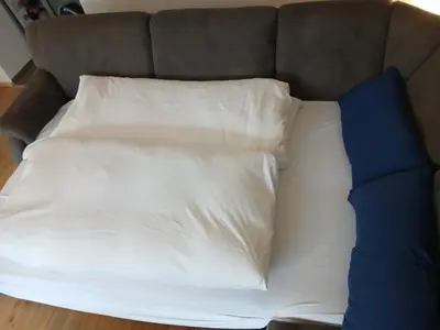 Ein Bett oder Betten in einem Zimmer der Unterkunft Fewo Gartenblick Altlußheim - Netflix- parken - Küche - Klimaanlage - Shuttle zum Hockenheimring