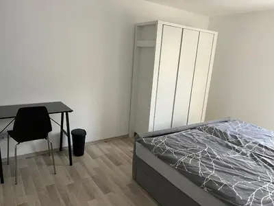 Ein Bett oder Betten in einem Zimmer der Unterkunft Haus Anna Bensheim