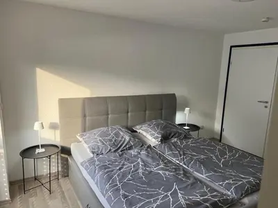 Ein Bett oder Betten in einem Zimmer der Unterkunft Haus Anna Bensheim