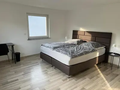 Ein Bett oder Betten in einem Zimmer der Unterkunft Haus Anna Bensheim