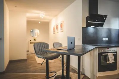 Küche/Küchenzeile in der Unterkunft Exklusives Apartment Sinsheim Luxus, 75 TV & Top Lage WeHome Premium